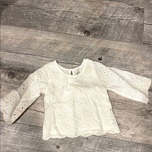 Eyelet bell sleeved blouse